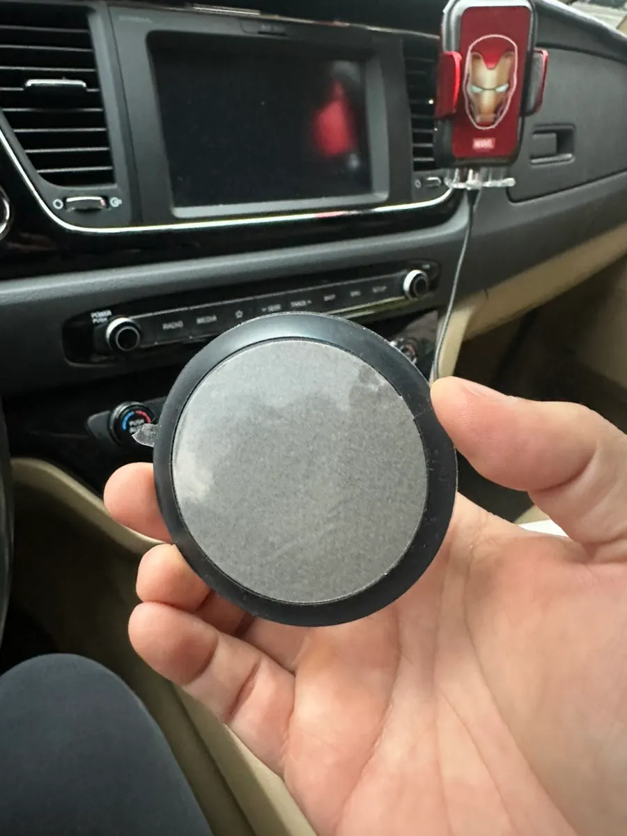 Dashboard base attachment area cleaned with an alcohol wipe