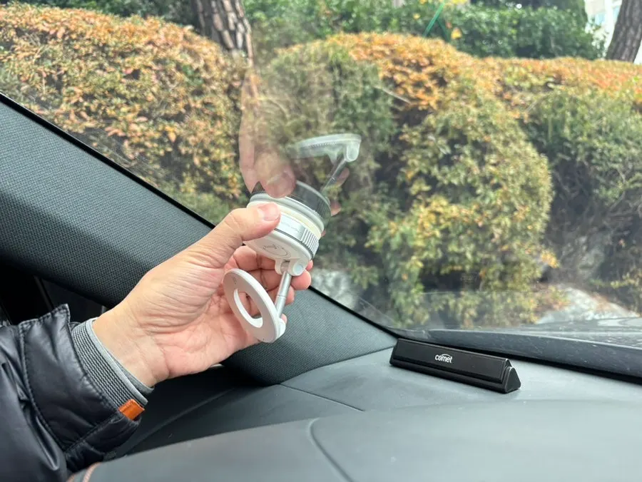 Car phone mount installed in the driver’s area