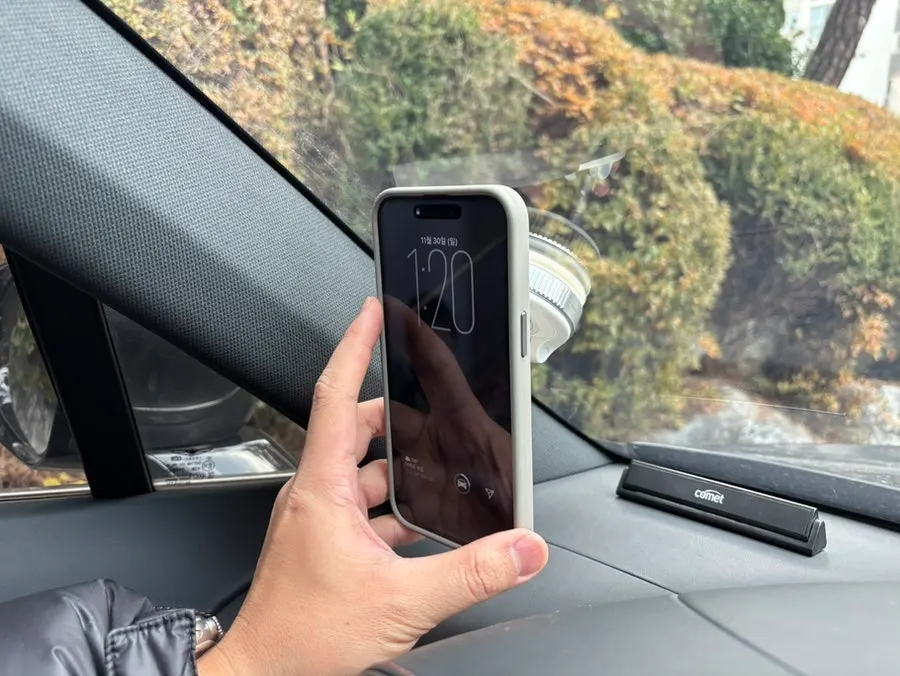 MagSafe phone mount holding an iPhone