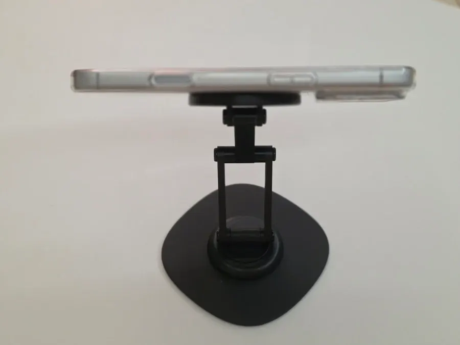 Rotating stand with adjustable tension