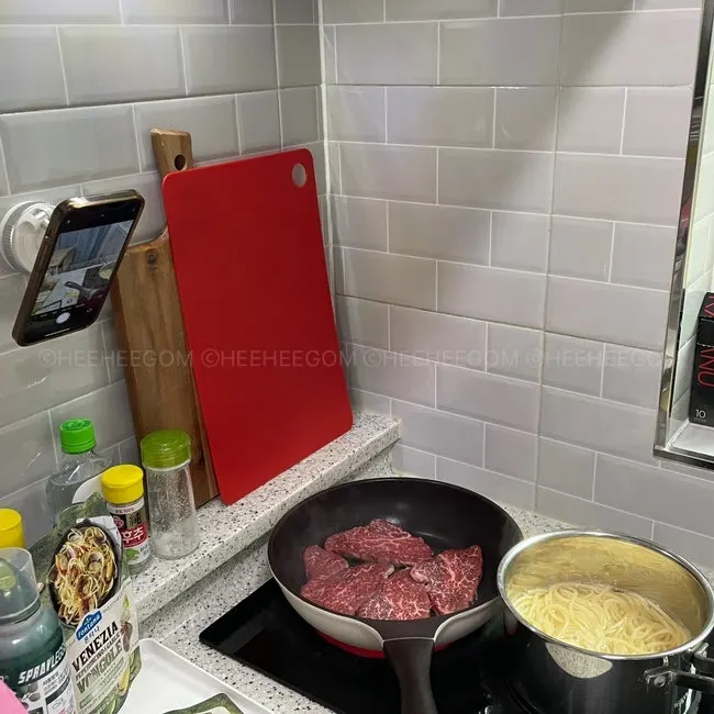Phone mount for recipes on a sink countertop