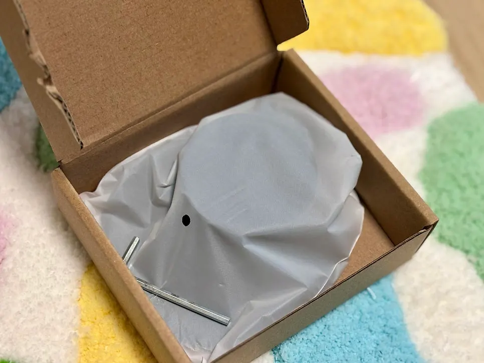 Plastic-wrapped Bitnya stand components