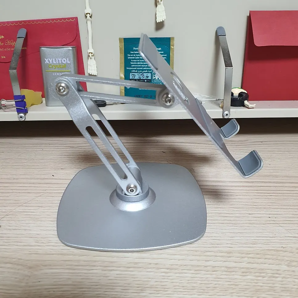Tablet stand with silicone finishing
