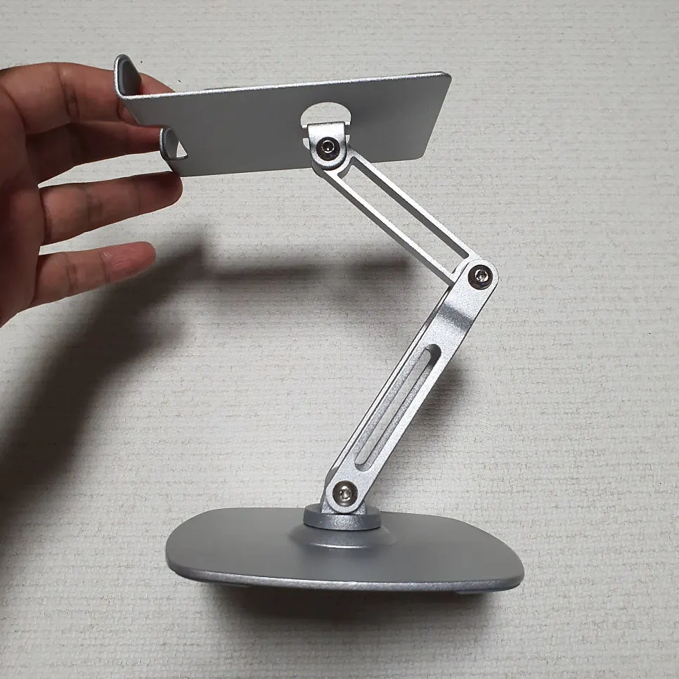 Foldable tablet stand stored away
