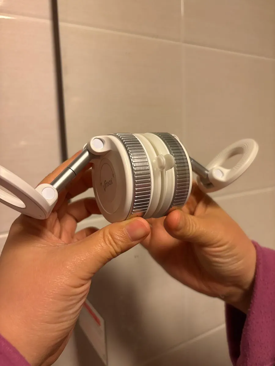 MagSafe phone attachment and removal