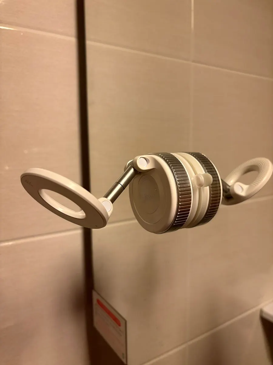 Mount attached to a mirror and glass