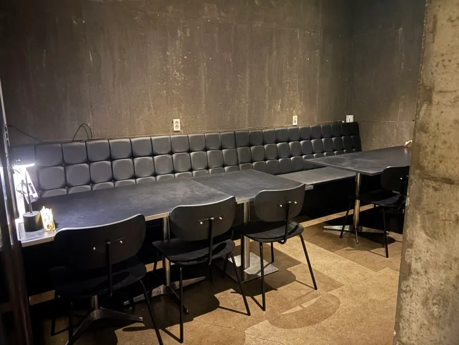 The dimly lit interior atmosphere of Bitters