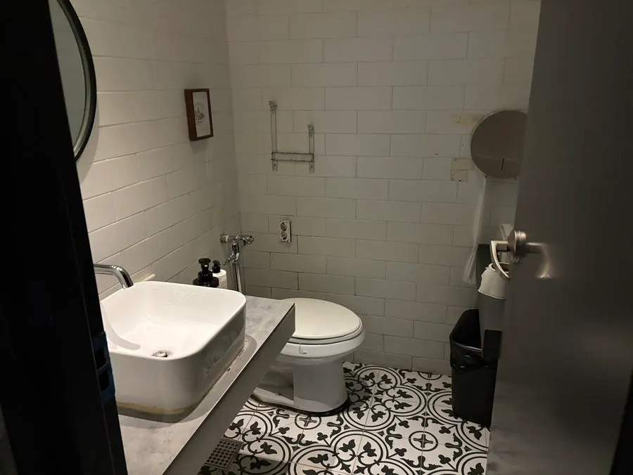 Mouthwash and cotton swabs provided in the restroom