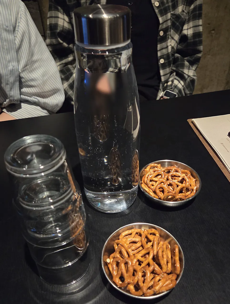 Basic pretzel snack with water and glasses
