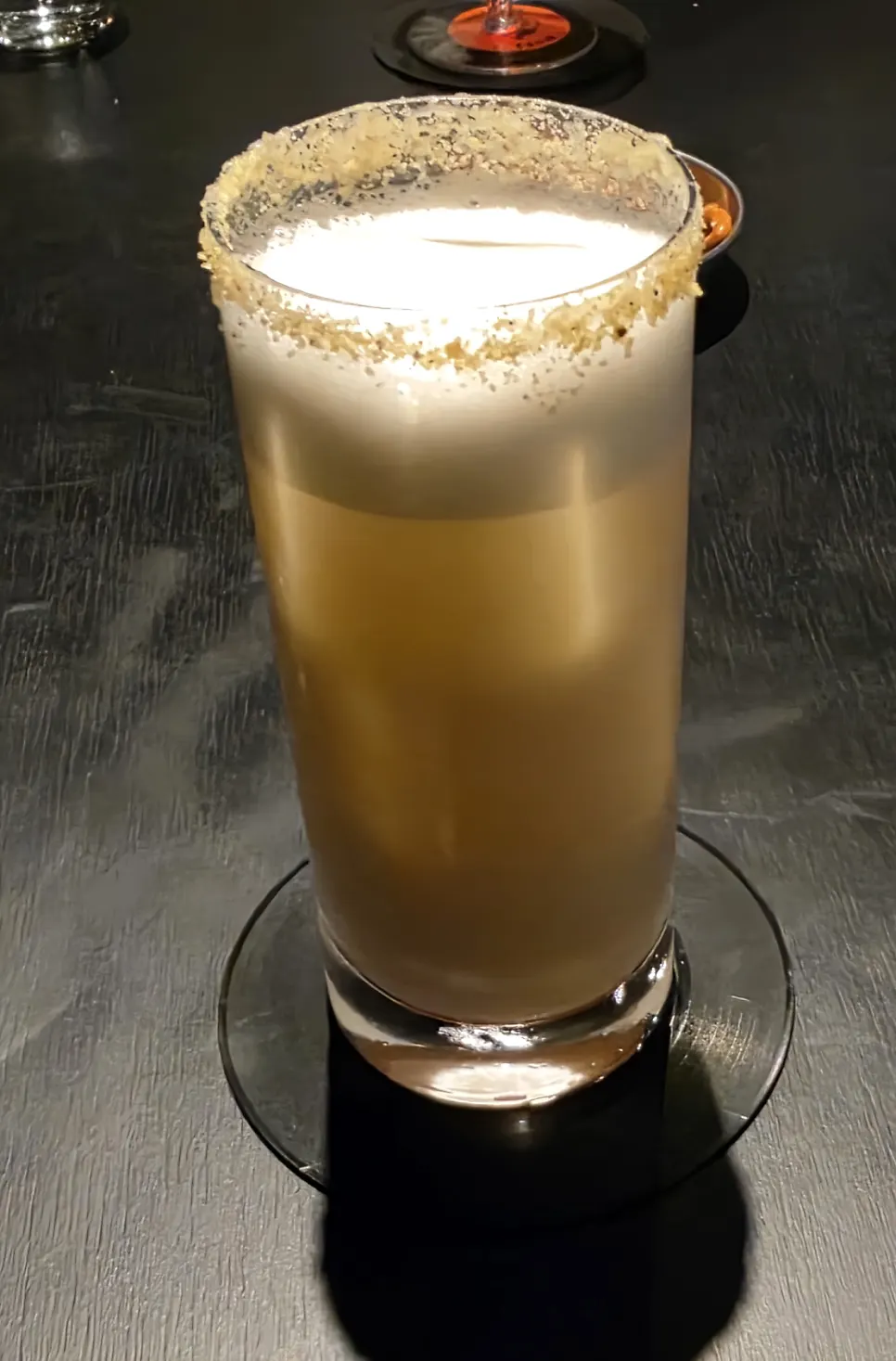 A creamy glass of Butterbeer cocktail