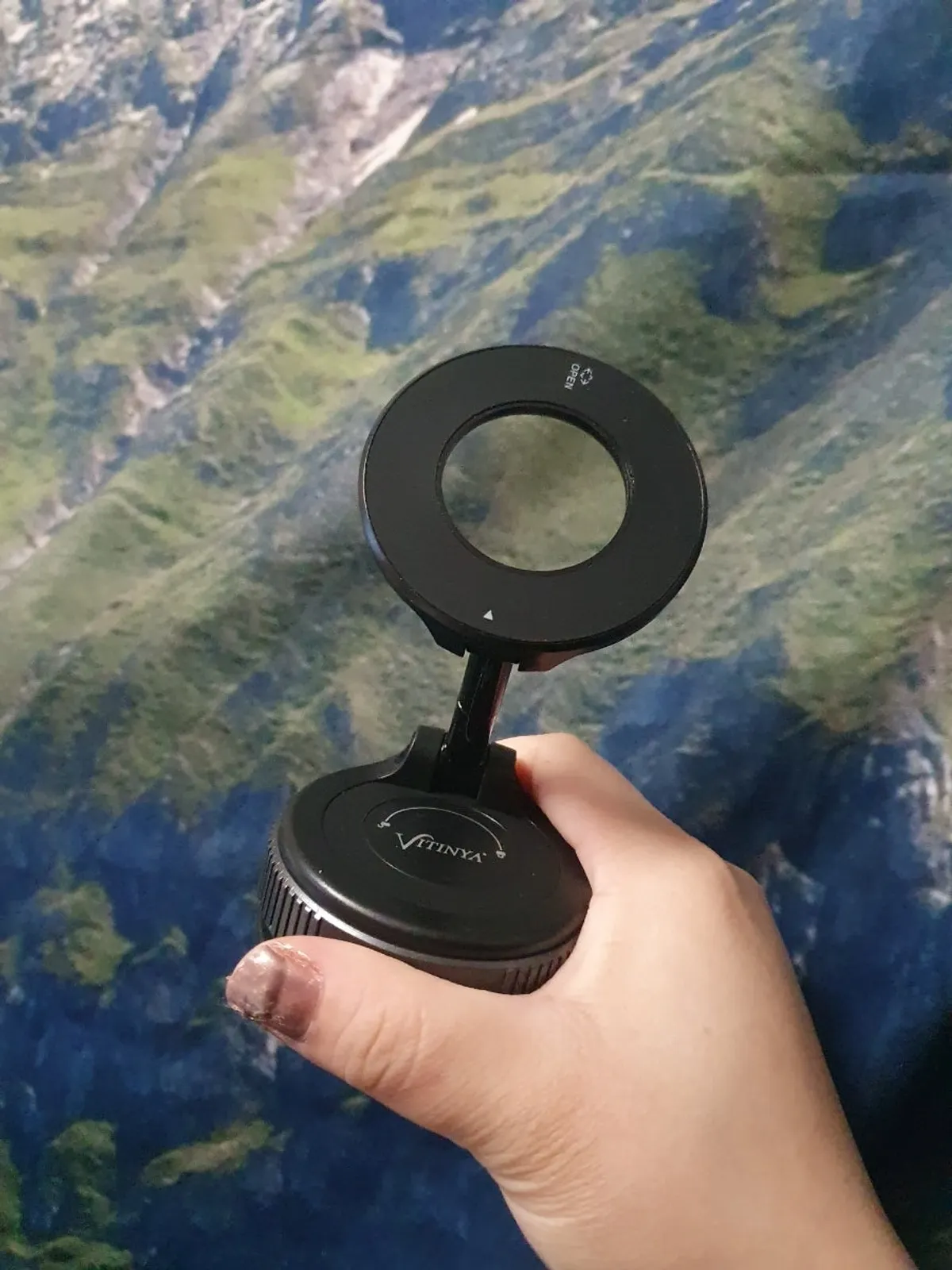 Vacuum-suction MagSafe mount used in a rental car
