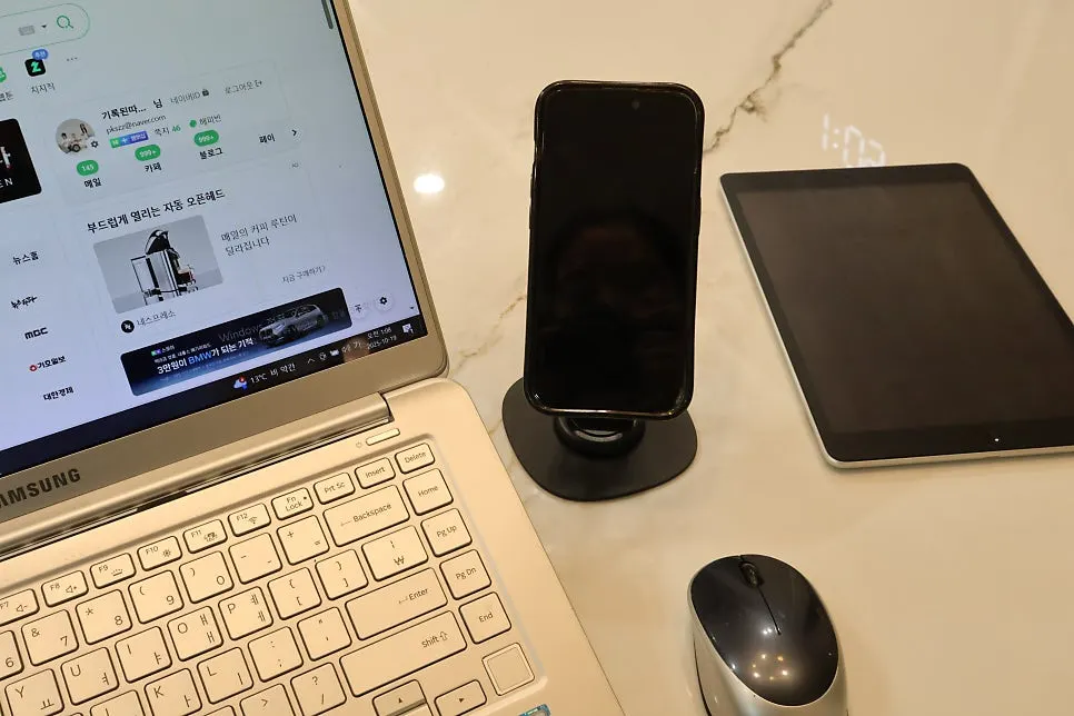 MagSafe stand used next to a laptop