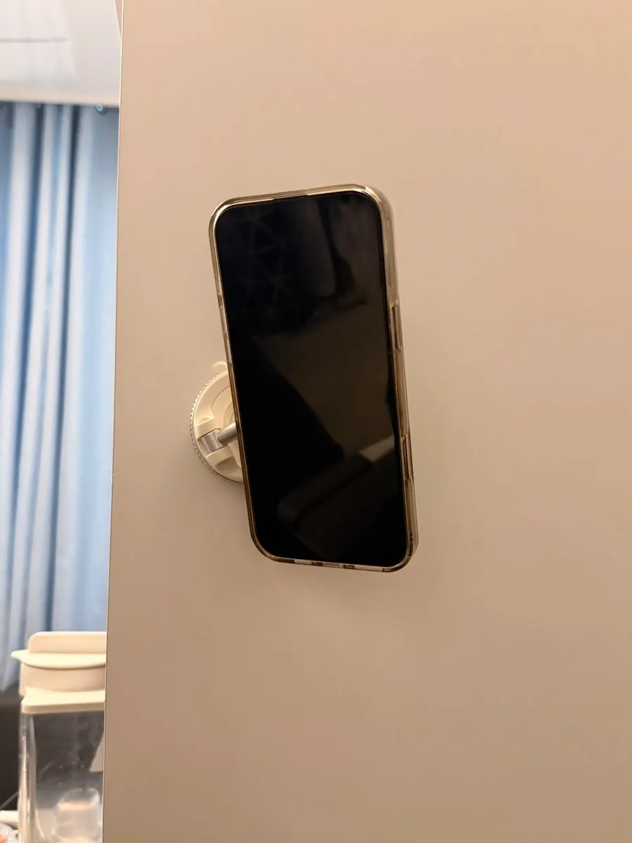 iPhone 16 Pro Max mounted on the holder