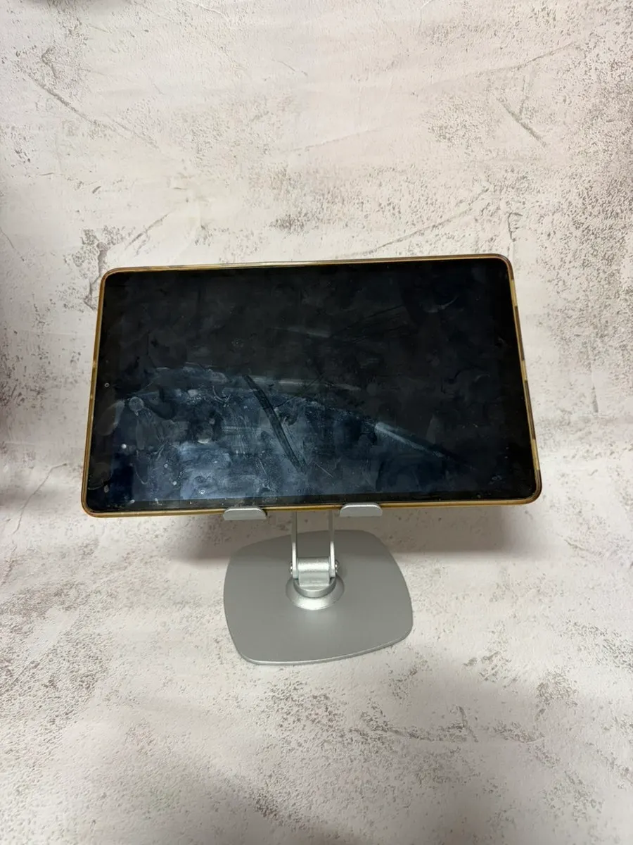 Stand for both a tablet and phone