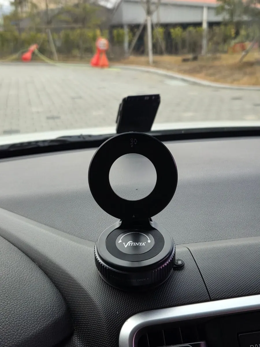 Vacuum-suction mount attached to a windshield