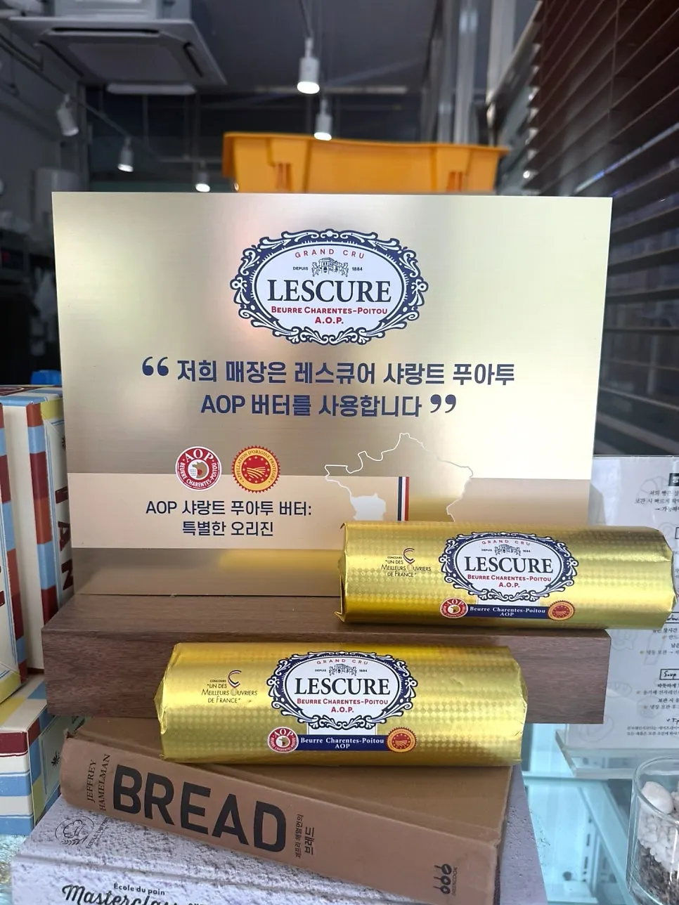 Sign noting the Lescure butter used at Boulangerie Tan