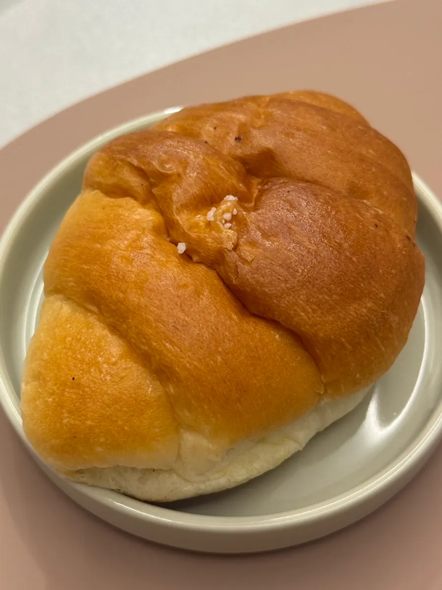 Bread laid out at home with coffee
