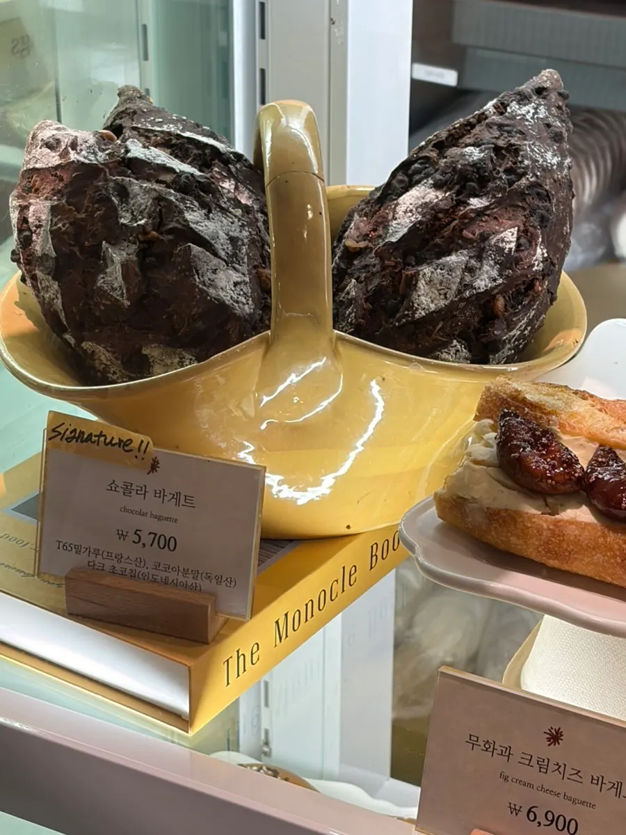 Close-up of a carrot rapée sandwich on display