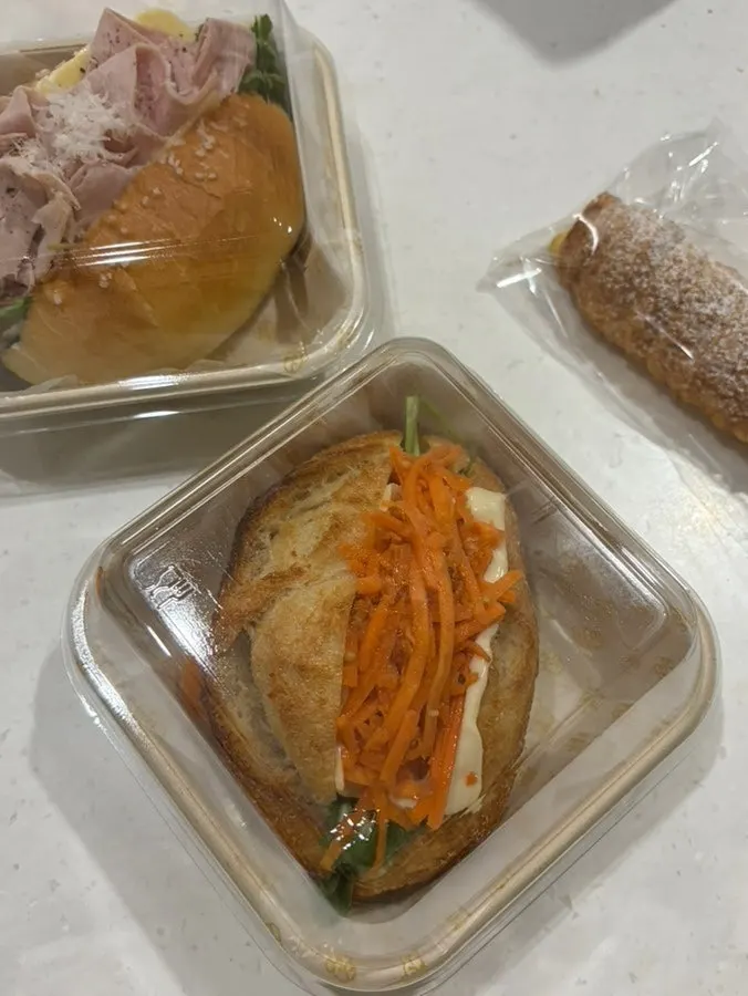 Baguette sandwich loaded with carrot rapée