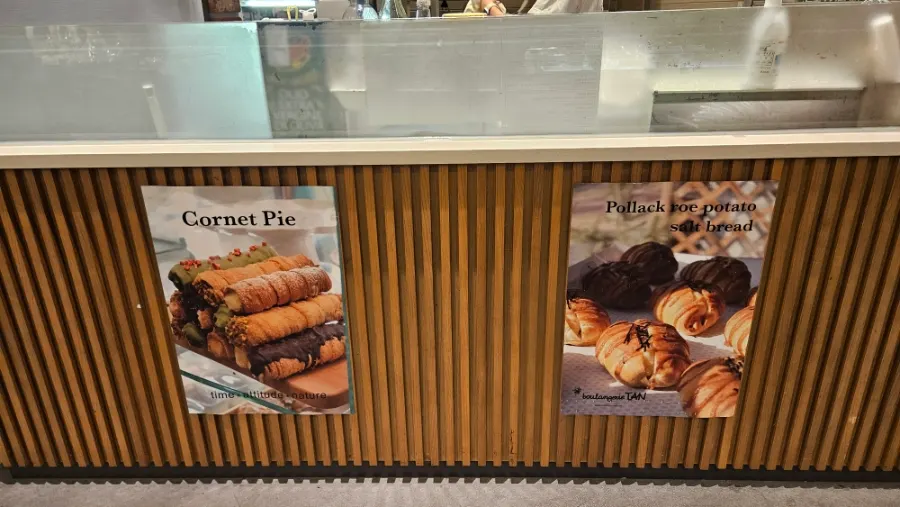 Storefront with the Boulangerie Tan sign visible