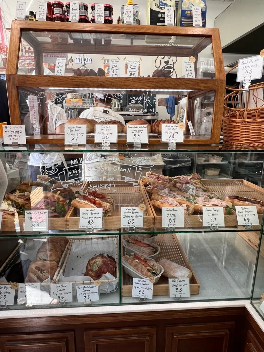 Bread display shelves inside Boulangerie Tan Unjeong Main Branch
