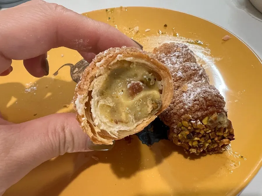 Cross-section of crispy pastry cornet pie with cream filling