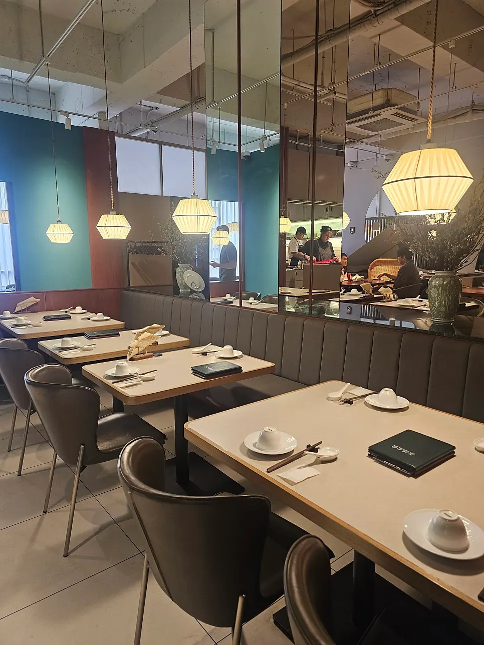 Large tables and open kitchen visible inside Bobo Sikdang