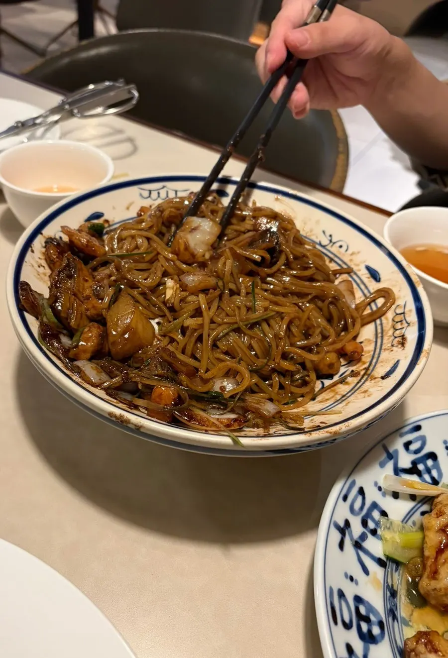 Abalone samseon jjajangmyeon topped with a soft fried egg