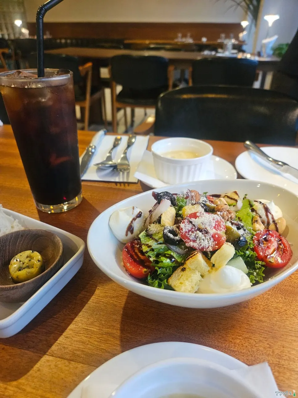 Table set with salad and bread