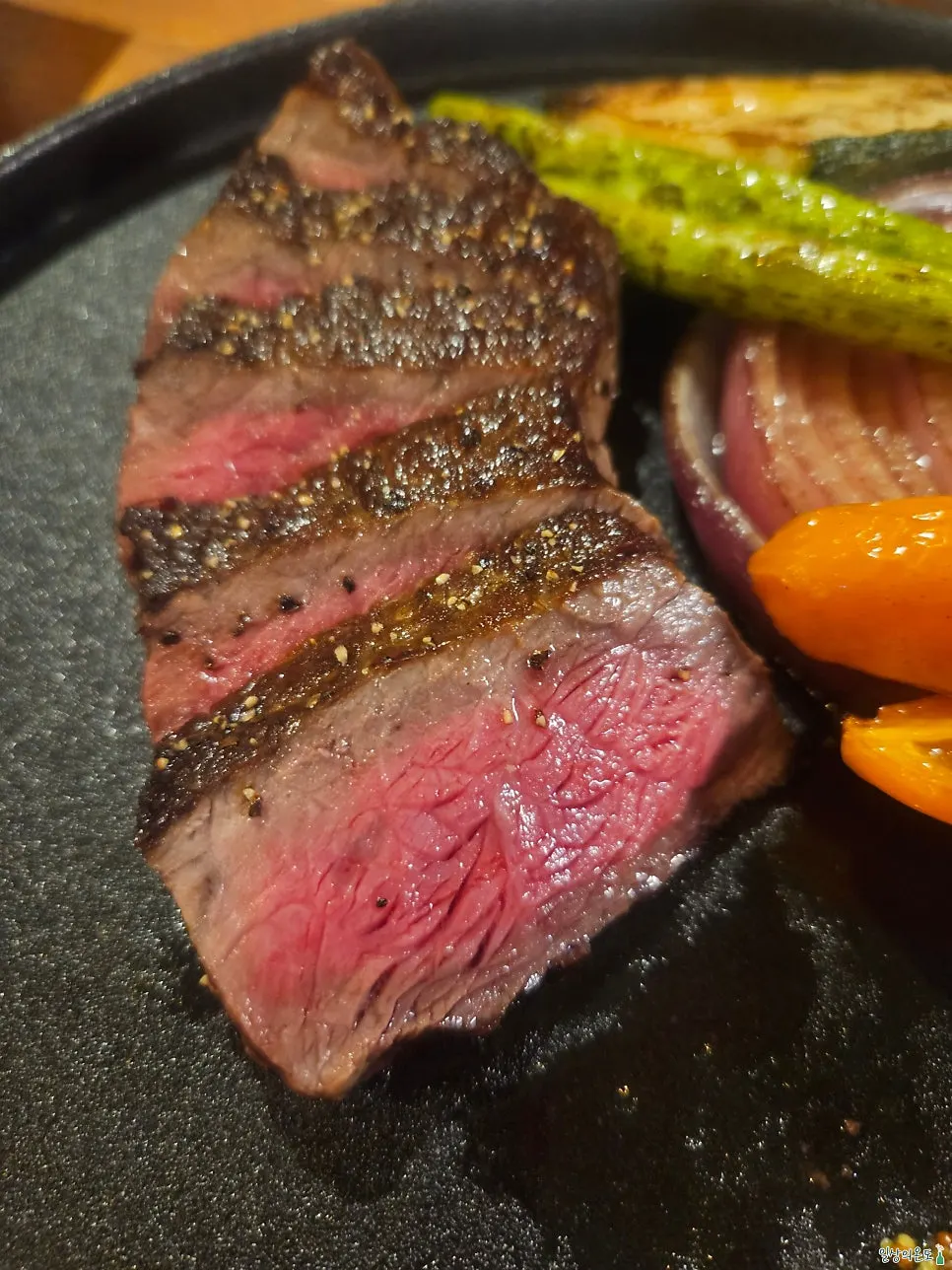 Korean beef striploin steak cooked medium well