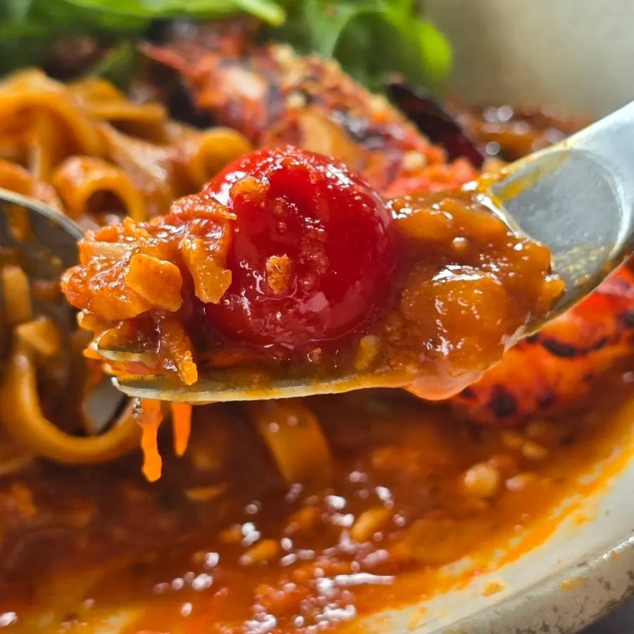 A portion of shrimp bisque pasta served out