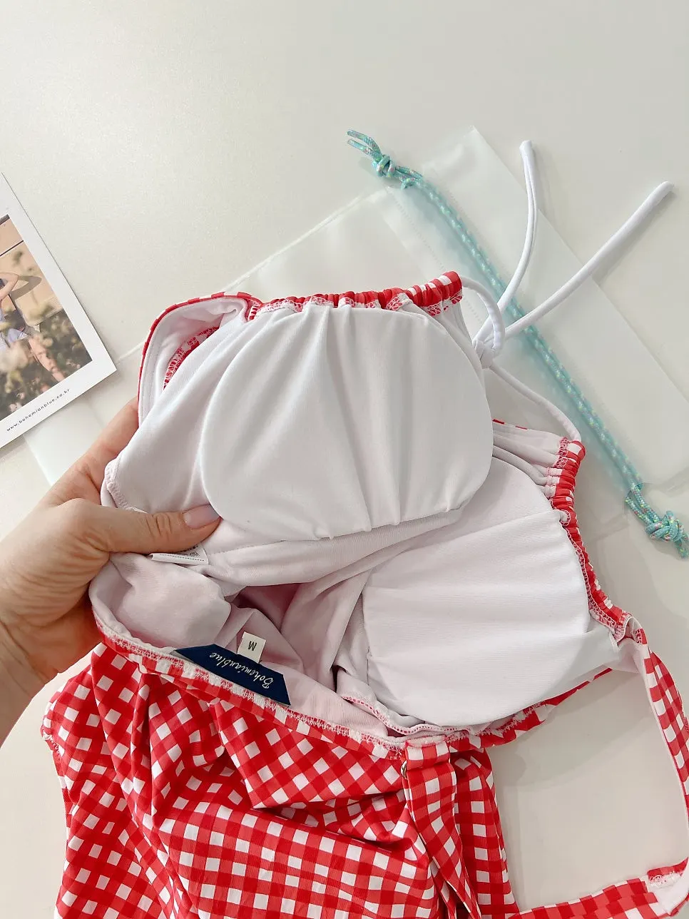 Pad opening on the gingham one-piece swimsuit