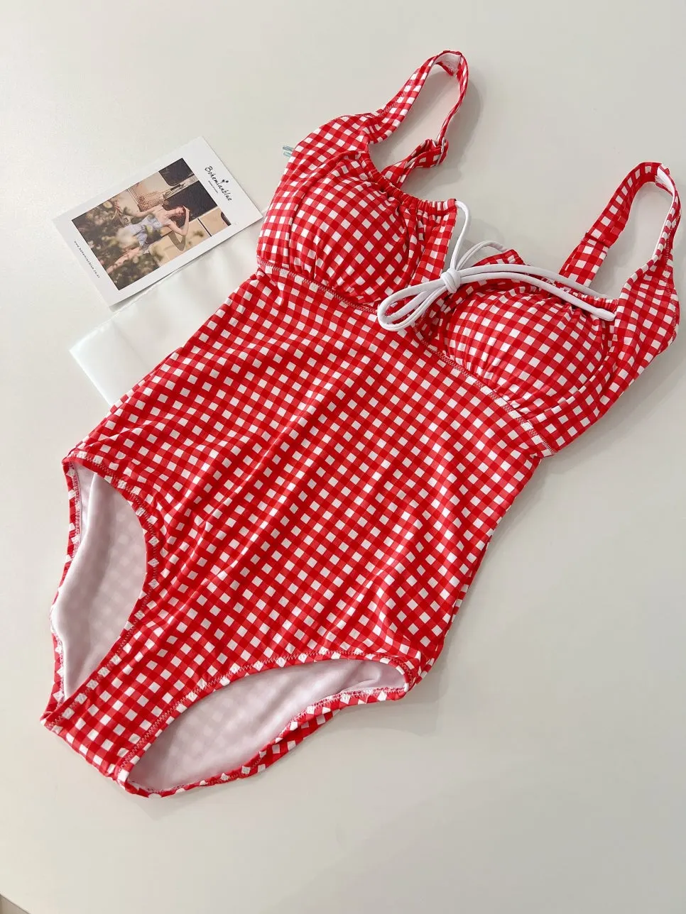 Gingham check pattern on the Bohemian Blue one-piece swimsuit