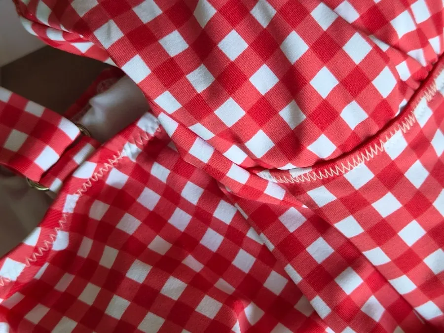 Hygienic plastic try-on liner attached to the one-piece swimsuit