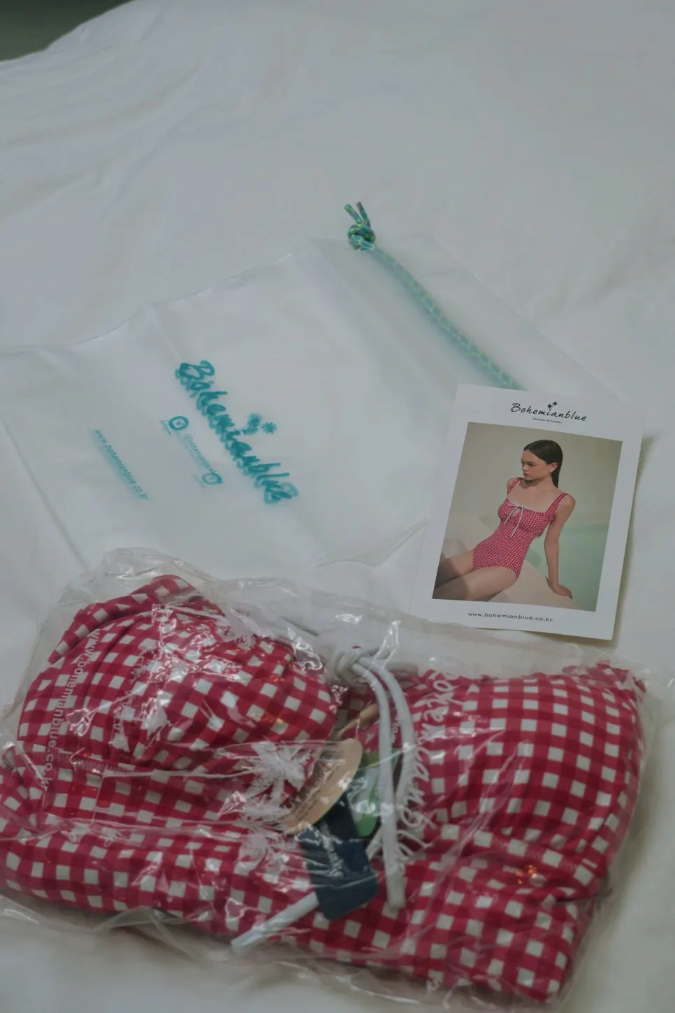 Gingham check swimsuit chosen with body coverage in mind
