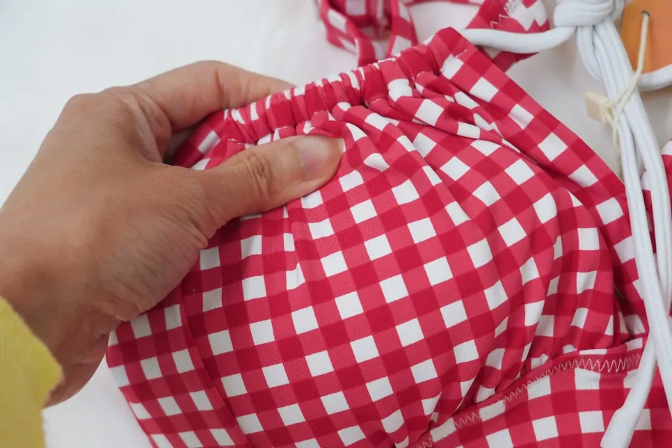 Check one-piece swimsuit with a shirring tie-up design