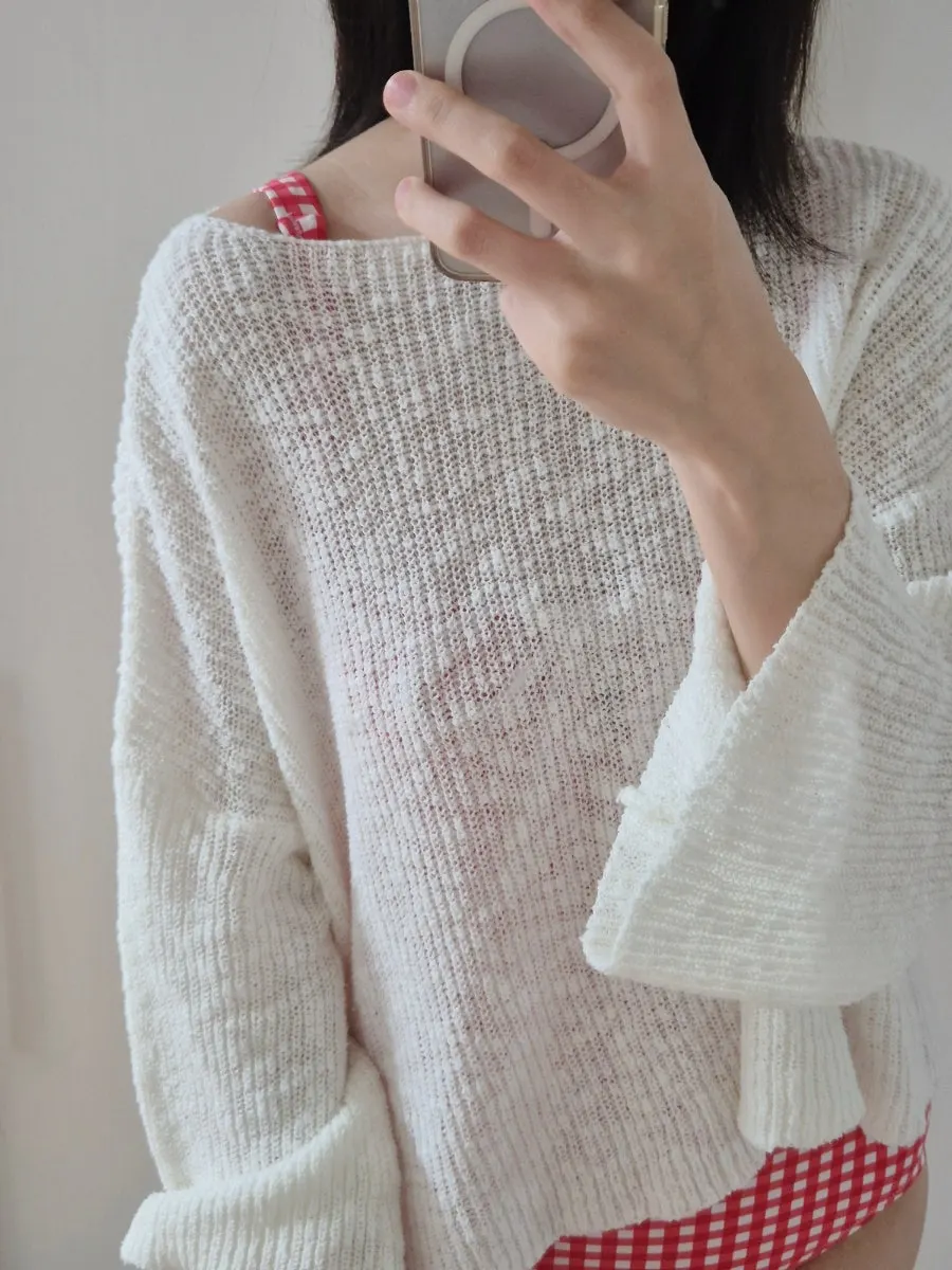 Silhouette of a square-neck checked one-piece swimsuit