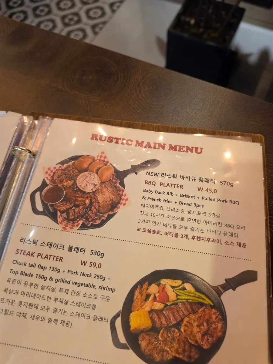 Menu board listing the BBQ platter and set menus