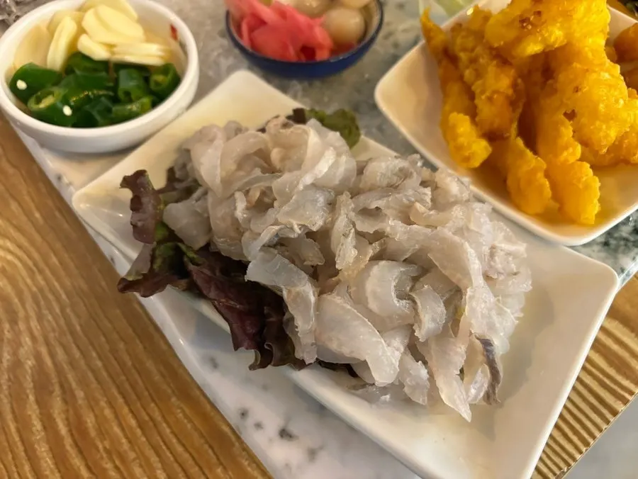 Assorted sashimi plate with flounder, rockfish, and salmon