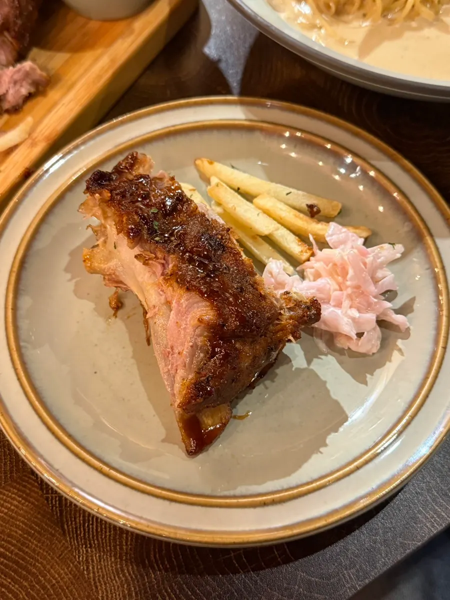 Baby back ribs served with fries