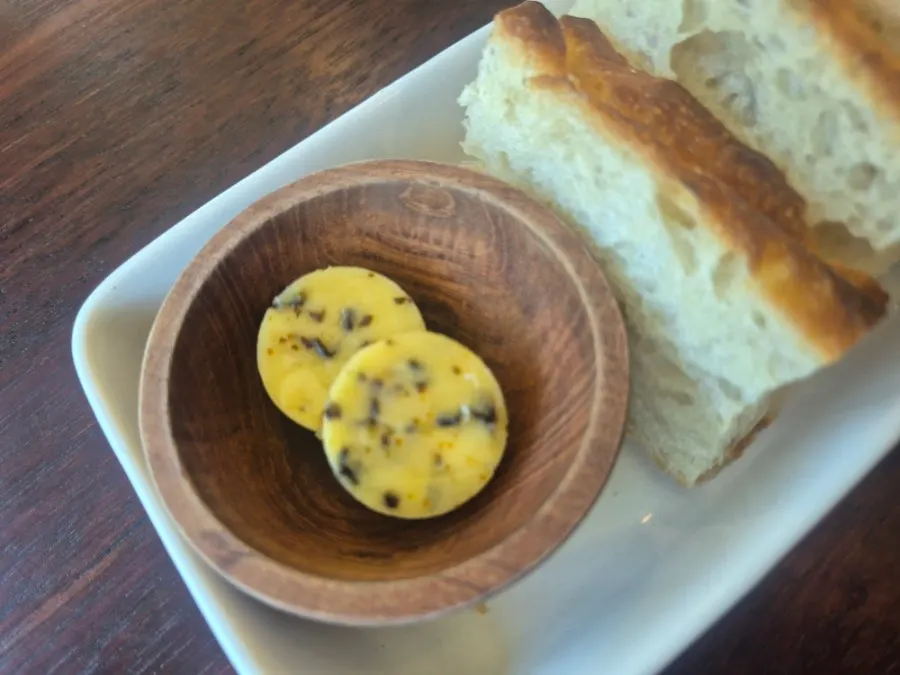 Table set with bread and kelp butter