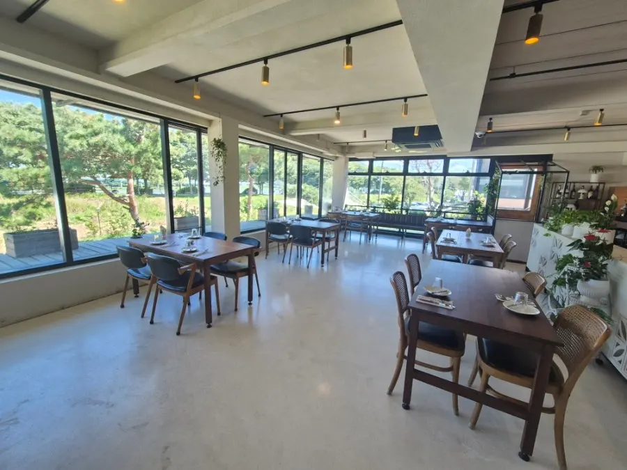 Wood-toned tables inside the 2nd floor