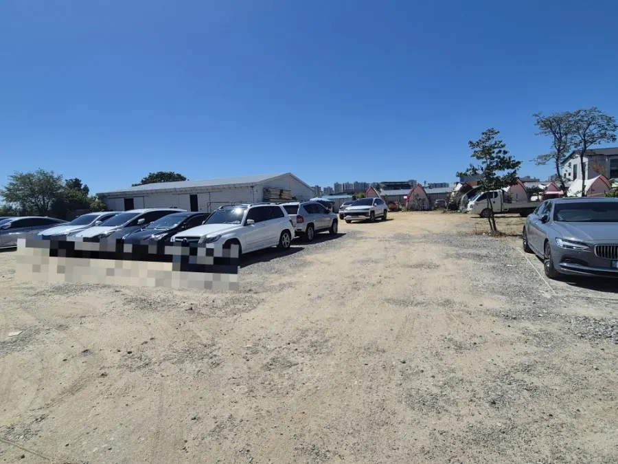 Parking lot and entrance behind the building