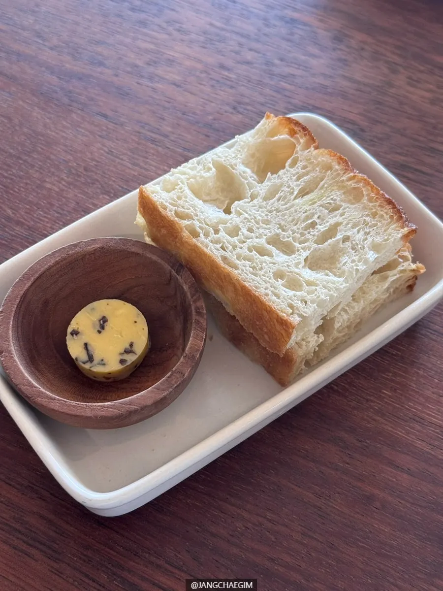 A cup of sweet corn soup with real kernel texture