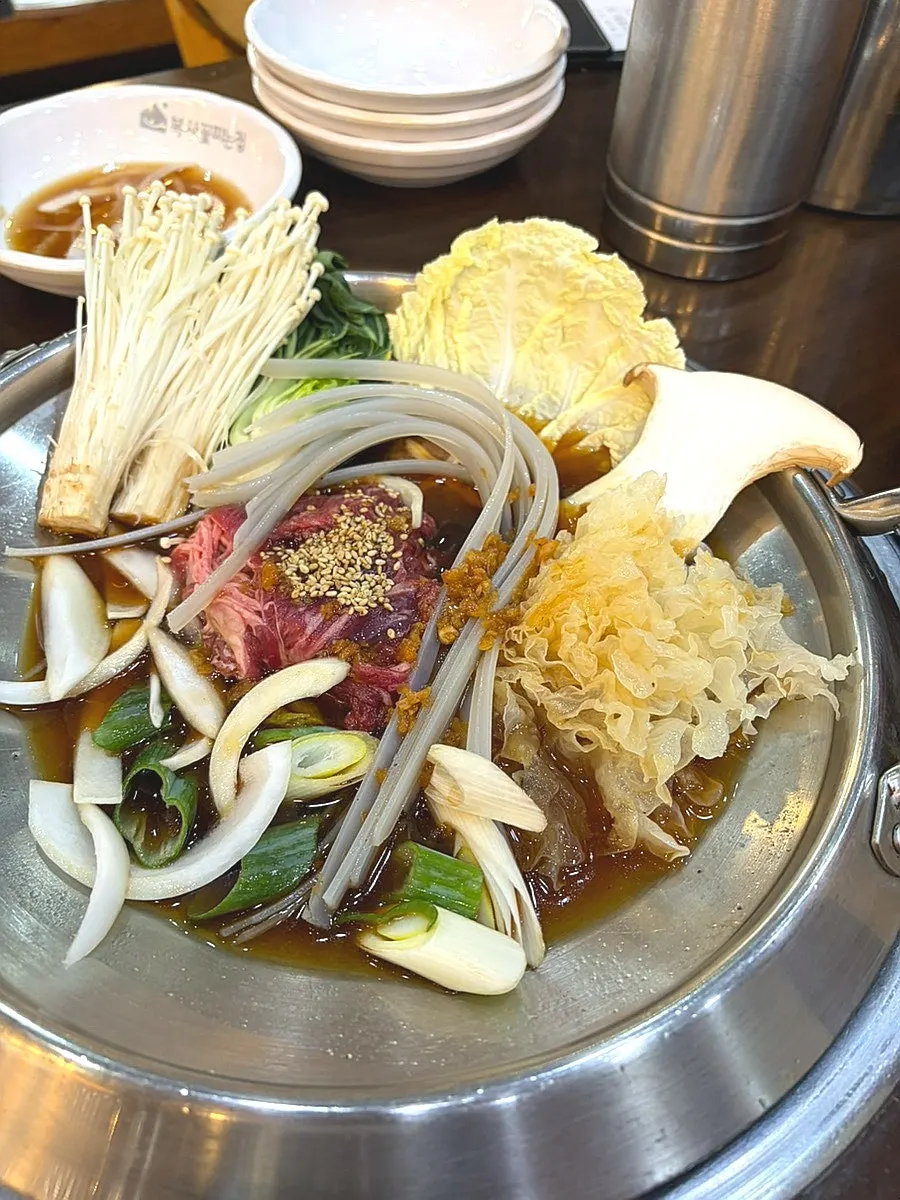 Bibimbap ingredients piled high with vegetables