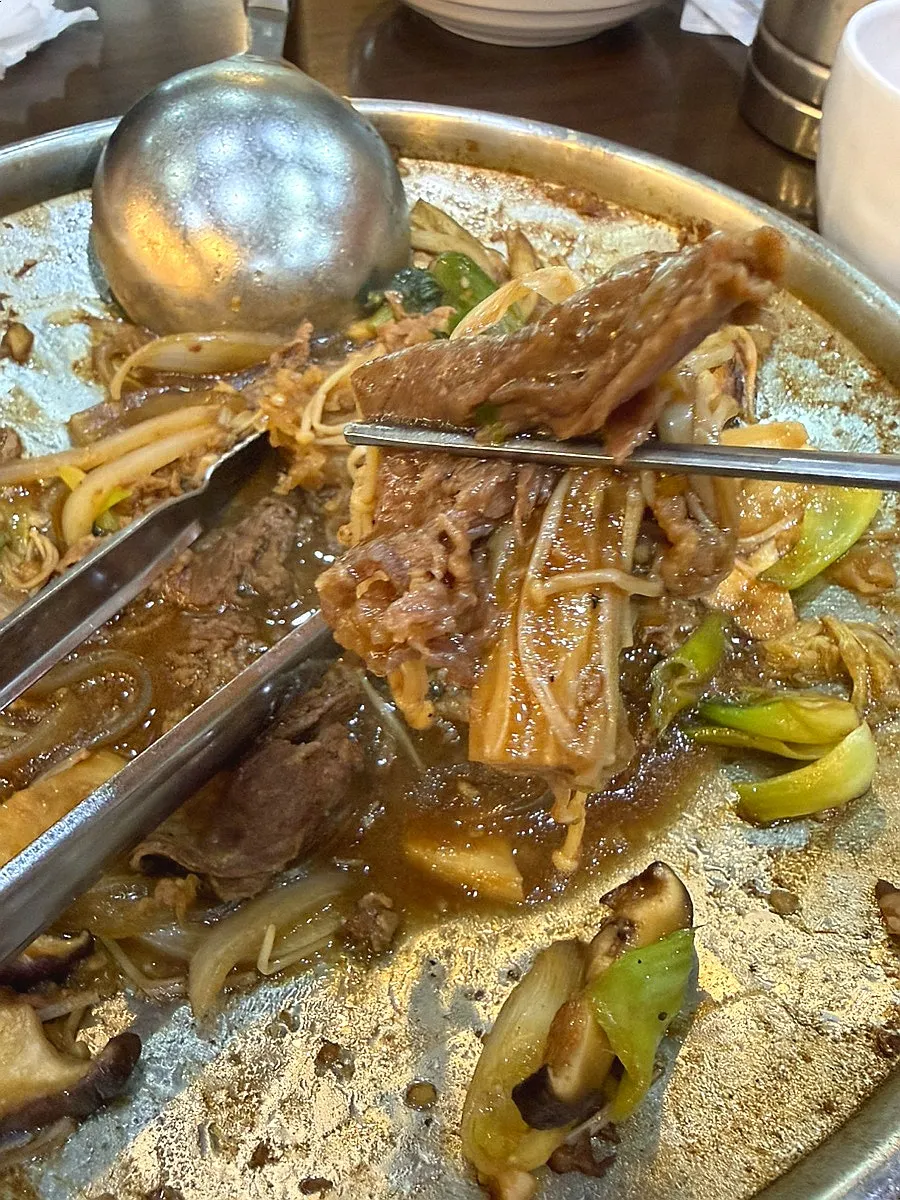 Mushroom bulgogi hot pot at a rolling boil