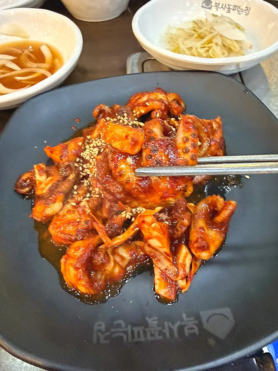 Charcoal-grilled jjukkumi stir-fry with smoky char flavor