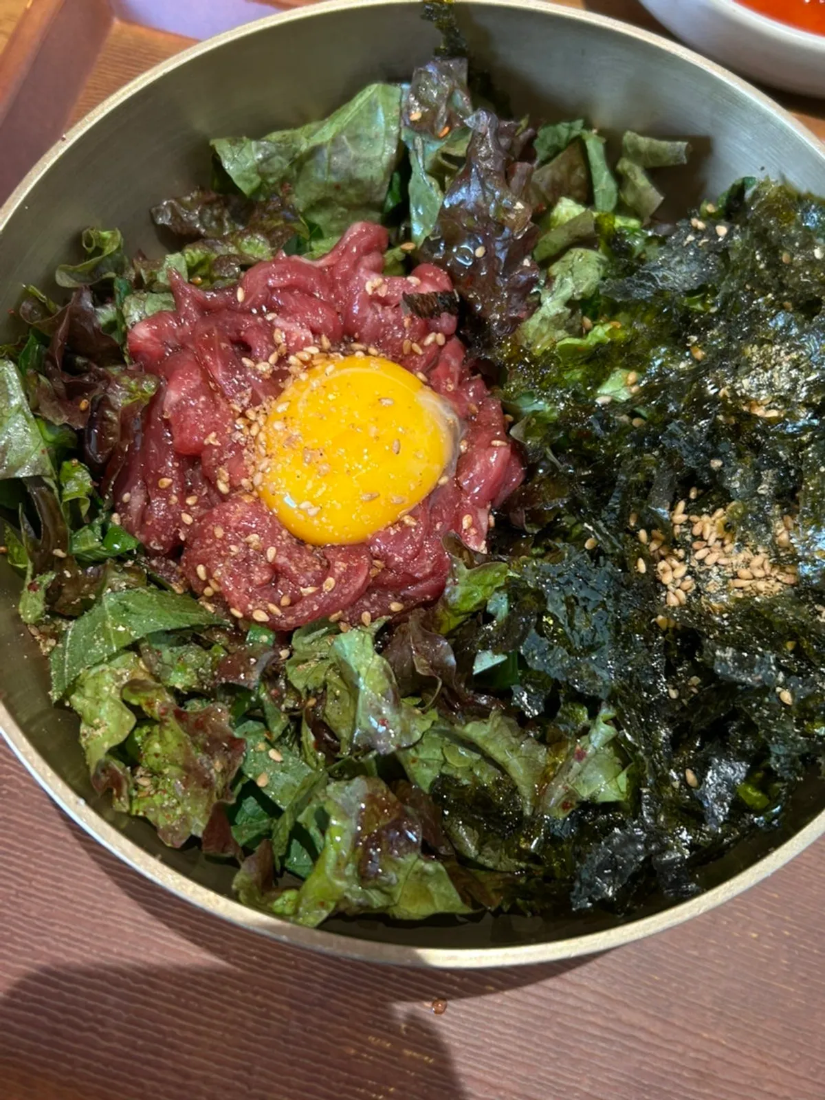 Boksan Haejang's yukhoe bibimbap before mixing
