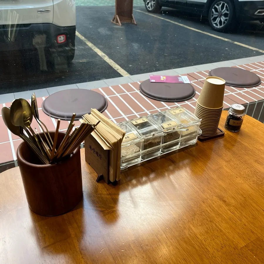 Table setting and side dishes at Boksan Haejang
