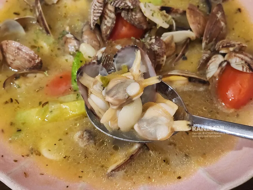 Plump clams picked out of the soup